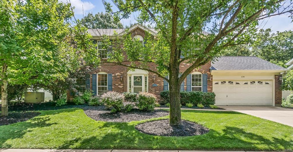 Ballwin, Rockwood Schools; Over 3000 square feet of nicely updated living space. 5 BR, 3.5 bath Two-Story; Hardwood floors, Crown Molding & Updated Lighting; French doors in Living Room;  Bay Window, Woodburning Fireplace w/ Brick Hearth and Dry-Bar/Pass-thru to kitchen; Complete kitchen remodel features center island, granite counters with tiled backsplash, tile floor, custom cabinetry, planning desk and SS appliances featuring gas stove; Main floor laundry. Vaulted Master Bedroom Suite with double-door entry; Updated Master bath features oversized frameless shower & separate tub, double vanity and newly installed tile; Three additional bedrooms and 2nd full updated bath complete the Upper Level; Finished walk-out Lower Level offers large Rec Room with wiring for Projection TV & Surround Sound, bedroom and third full bath; Deck & Patio overlook large level yard backing to heavily treed common ground; Nicely landscaped; Sprinkler Sys.  Zoned HVAC. Located on a quiet cul de sac street.