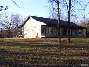 Beautiful custom built home on 10 m/l acres outside of St. James. Home features 4 bedrooms, 4.5 bathrooms, open floor plan, large living/dining room combo w/French doors accessing deck. Large custom Kitchen is a Chief’s dream! Featuring an abundance of custom cabinetry, island work space, and a walk-in pantry. Master suite features a bay window, walk-in closet, custom cabinetry, walk-in tiled shower w/rain and wall shower heads. Two bedrooms share a Jack-n-Jill bath with beautiful custom cabinetry. Main laundry/mud room has easy access to/ from deck via the kitchen. Finished lower level has a wonderful family room, w/French Doors to patio, kitchen/bar area, 4th bedroom w/walk-in closet, 2 full additional baths, laundry area, utility room, storm/storage area and another area for game room, office or apartment. This country home is a place your whole family is going to love! Give us a call today! SpecialListingConditions: Foreclosure
