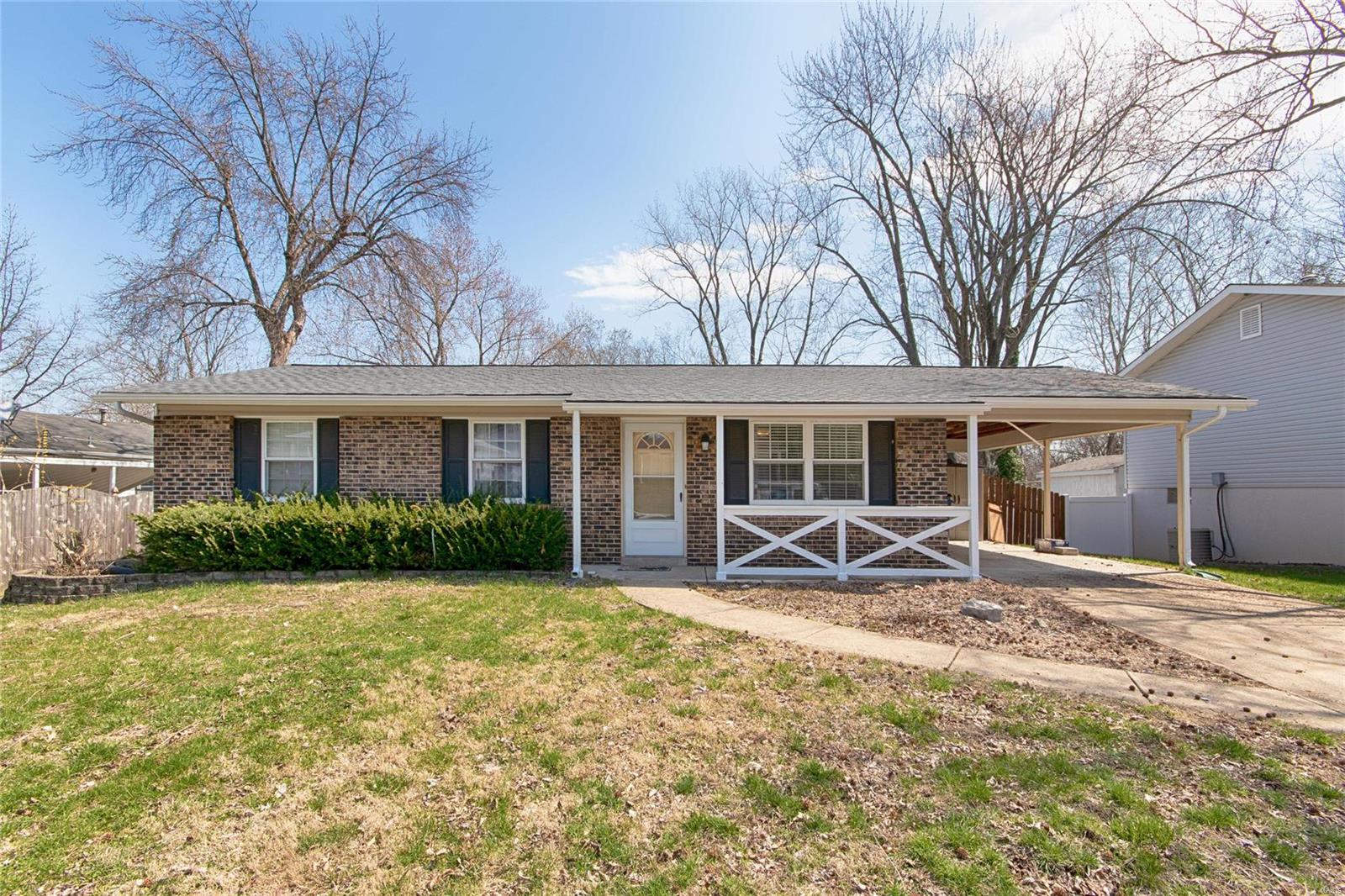 Stop searching, you've found it! Welcome home to this beautiful home, nestled in the Cardinal Wood neighborhood in St. Charles! Minutes away from Elm Street where you can find plenty of shopping and eateries! Plus, easy access to Highway 370! This 3 bedroom/1.5 bath ranch has so much to offer! Enter into the living room, offering all wood flooring, a ceiling fan, and an oversized window to let in that springtime sunshine! The eat-in kitchen features rich, dark wood cabinetry, stainless steel range, and double sink. All three bedrooms are on the main level, have carpet throughout, feature ceiling fans, and have double-wide closets with sliding doors. The main level also offers a full and a half bath. Enjoy entertaining in this gorgeous weather outside on the huge patio in the backyard! This property boasts a newer HVAC system (furnace, a-coil, and A/C), electric panel, water heater, siding/roof/gutters, and range/hood! Schedule your private showing today! Showings Start Saturday 4/6!
