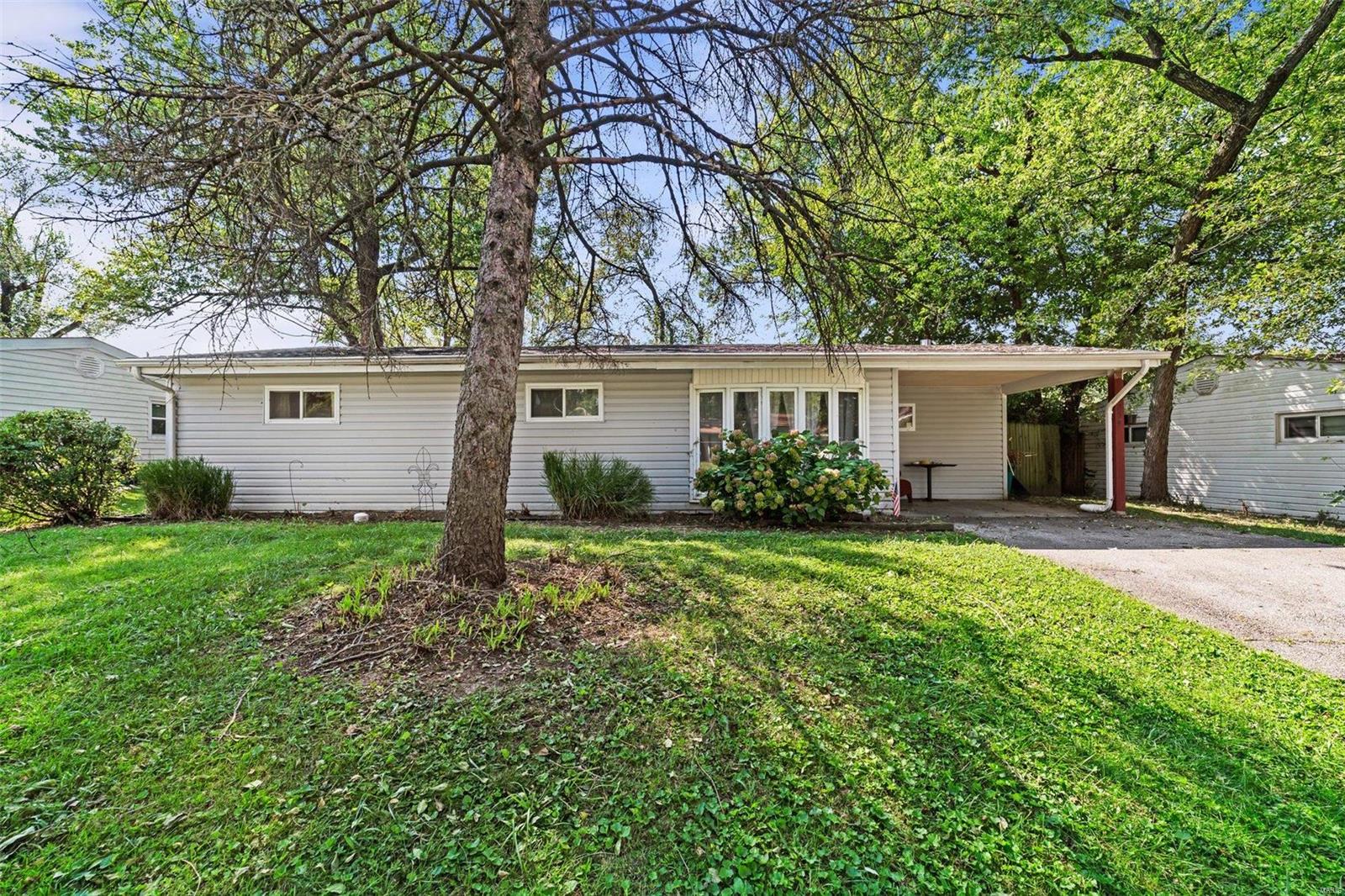 Open House Sunday, 10/10 from 1-3 pm! Calling all wanting to size up, size down, or take a jump into real estate investing! Here is your complete 3 bedroom, 1 full bath and 912 sq ft home of main level living! This home features a separate dining area, spacious kitchen with bright white cabinets and all appliances to stay (including the washer and dryer), separate storage/laundry room and inviting living room with bay window. The lot is .139 acres and has a nice flat, very usable yard. Covered off-street parking complete this slab, low maintenance home. Minutes from the airport with easy access to 70, 270, 170 and St Charles Rock Road. A lot of shopping and conveniences nearby. Don’t miss out on this one! Selling in "as is" condition and seller is offering a $2,000 flooring allowance to replace carpet with your choice of flooring! Welcome Home!
