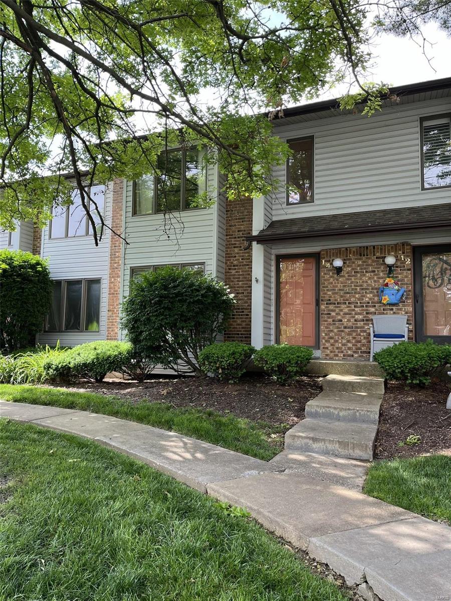Photos will be available soon.  This charming two story two bedroom, two and a half bathroom, two car garage condo, located near I-70, speaks location!  This home also has quick access to major grocery, pharmacy, fine restaurants and St. Peters Golf Course.  This condo is located towards the back of the subdivision on a cul-de-sac with limited traffic and noise.  The main floor offers a large family room with wood burning fireplace and brand new sliding glass door that takes you to the oversized, updated deck.  There's also an eat in kitchen with pantry.  
The bedrooms are located on the second level, both are roomy with walk-in closets and each has it's own full bathroom.  
The lower level is mostly finished and has additional space for an office or bonus room.  There is also a utility room with laundry and storage.  The two car garage also has space for additional storage.
Water, Trash and Sewer is included with HOA. Location: Other