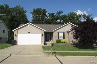 Check out this beautiful ranch home complete with tons of upgrades and custom finishes! The open floor plan with vaulted ceilings is perfect for entertaining. Amazing custom kitchen features; tall cabinets, breakfast bar, pantry, backsplash, upgraded fixtures and switches. Master bedroom suite has huge walk in closet and master bath with jetted tub and walk-in shower. Don't miss the spacious composite 24x16 deck and covered patio with surround sound! This home is also complete with a fully finished lower level featuring; laminate hand scraped wood floors, custom bar, huge recreational room and amazing custom bathroom featuring a focal point shower!