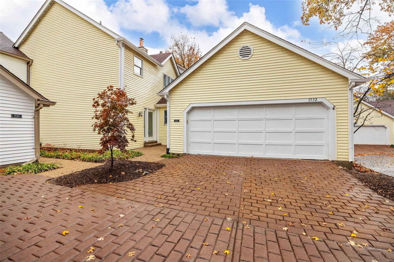 Experience the comfort & elegance in this beautiful Chesterfield townhome. Boasting 2 bedrooms, 4 bathrooms & 3 thoughtfully designed levels of living space, this home is freshly painted & move-in ready. Located on a private cul-de-sac, it offers an attached 2-car garage, 2 spacious decks with breathtaking lake views, extra living space in the lower level that walks out to a serene, fenced yard for your personal oasis. Inside you’ll find a bright, open-concept layout that fills the home with natural light & beautifully frames the lake vistas.The townhome community provides resort-style amenities, including a clubhouse, sparkling pool, tranquil lake & winding walking paths, perfect for evening strolls. Conveniently situated just minutes from Chesterfield Central Park, the Aquatic Center & the Amphitheater, this townhome also offers quick access to Chesterfield Valley & Highway 40, making your commute a breeze. This lakeside sanctuary won’t last long, make it your new home today! Additional Rooms: Workshop/Hobby Area Location: Suburban