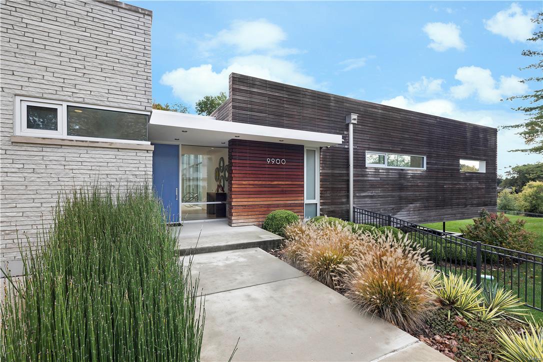 This exceptional modern residence is tucked into a private oasis in Ladue. Designed by renowned architect Phillip Durham, in an ‘H’ shape that creates two private exterior living spaces that are visually separated from road access and views of adjacent neighbors. The natural exterior is Wisconsin limestone and Ipe boards in a rain screen installation. Unique interior finishes are of the highest quality:custom milled 5 inch Indiana hickory plank floors, Danby marble, commercial doors and windows, custom cabinetry and interior doors are Kyoto-a hard wood African veneer. First floor office, mud room/cubby area, and laundry.The Master bedroom suite is on the main level along with a guest room suite/den, both with access to exterior living spaces.The second floor has the additional bedrooms and baths along with a sitting area and outdoor terrace. Wired for sound inside and out. 220 volt hook up in garage for electric cars, 220 volt hook up in basement gym area, and FULL home generator. Additional Rooms: Mud Room