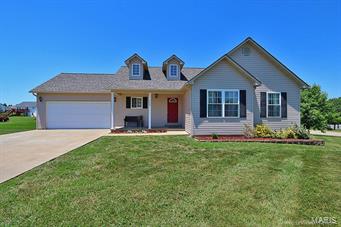WELCOME HOME!!  Fantastic 4 bedroom 3 bath home in Fox Glen Subdivision sits on a large corner lot.  Features a large open floor plan, main floor laundry, breakfast bar, wood floors, big two car garage, AWESOME Master Suite.  Full finished, walkout basement with family room, bedroom & bath.  Large beautiful yard with large deck, pool and concrete patio.