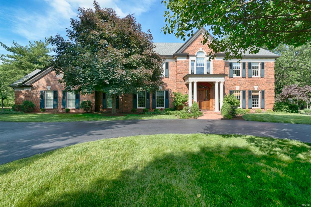 Situated on an exclusive lane in the heart of Frontenac sits this 5b/4.5b estate boasting over 5,000 sq ft of luxury living space. Fabulous attention to detail starting with exquisite moldings throughout main level where the foyer is anchored by a formal dining and living room and family room with a handsome beamed ceiling and gas fireplace. The eat-in, gourmet kitchen displays stunning cabinetry, counter-tops and high-end appliances and opens to an expansive great room with vaulted ceiling and gas fireplace. Main level bedroom suite offers an opulent bath and fireplace.  4 additional bedrooms up; including the master suite with stylish bath and walk-in closet. The LL offers a large rec room, fitness area, and full bath. From the main level, walk out onto the back veranda with a large patio and private in-ground pool with fountain. A beautifully landscaped exterior with matured trees surround the property. It will be easy to fall in love with this stunning home and all it has to offer. Additional Rooms: Mud Room