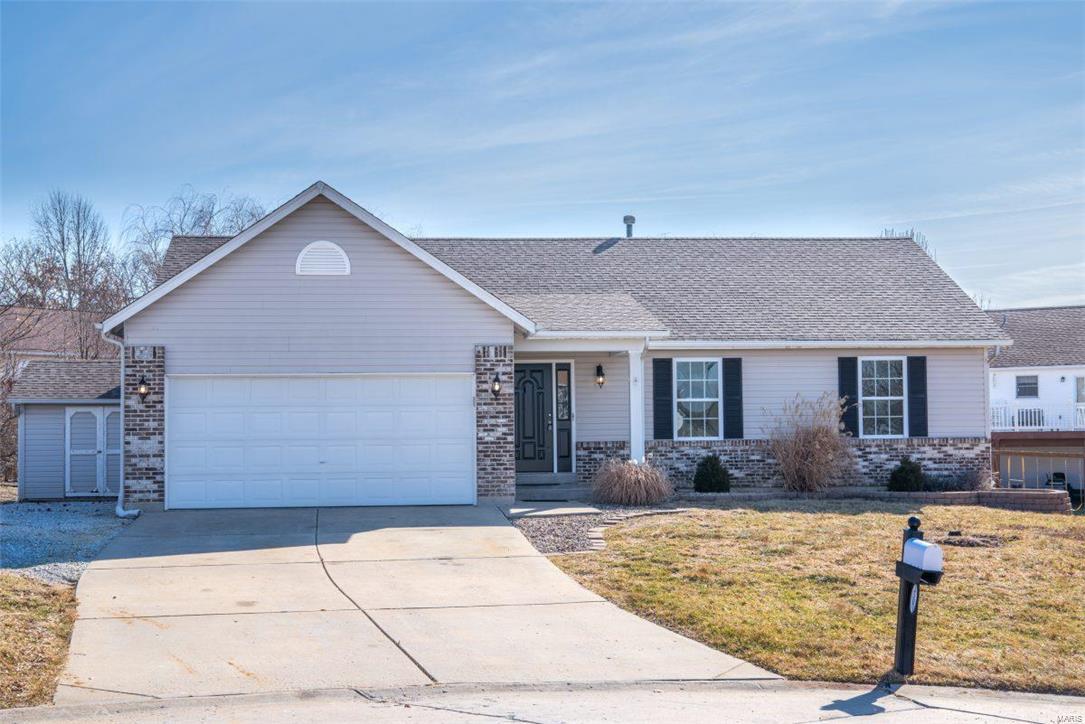 Beautiful ranch home in perfect location. This home is close to shopping, schools, and parks. Recently updated with all new flooring, paint and light fixtures. The kitchen has new SS appliances, modern backsplash, and eat-in kitchen with slider door. Just off the kitchen is the large deck with fenced section of yard. Large bedrooms and a finished lower level with bar area and extra bath makes this home perfect. Outside is an added storage shed! This home is well maintained and located in a great subdivision.