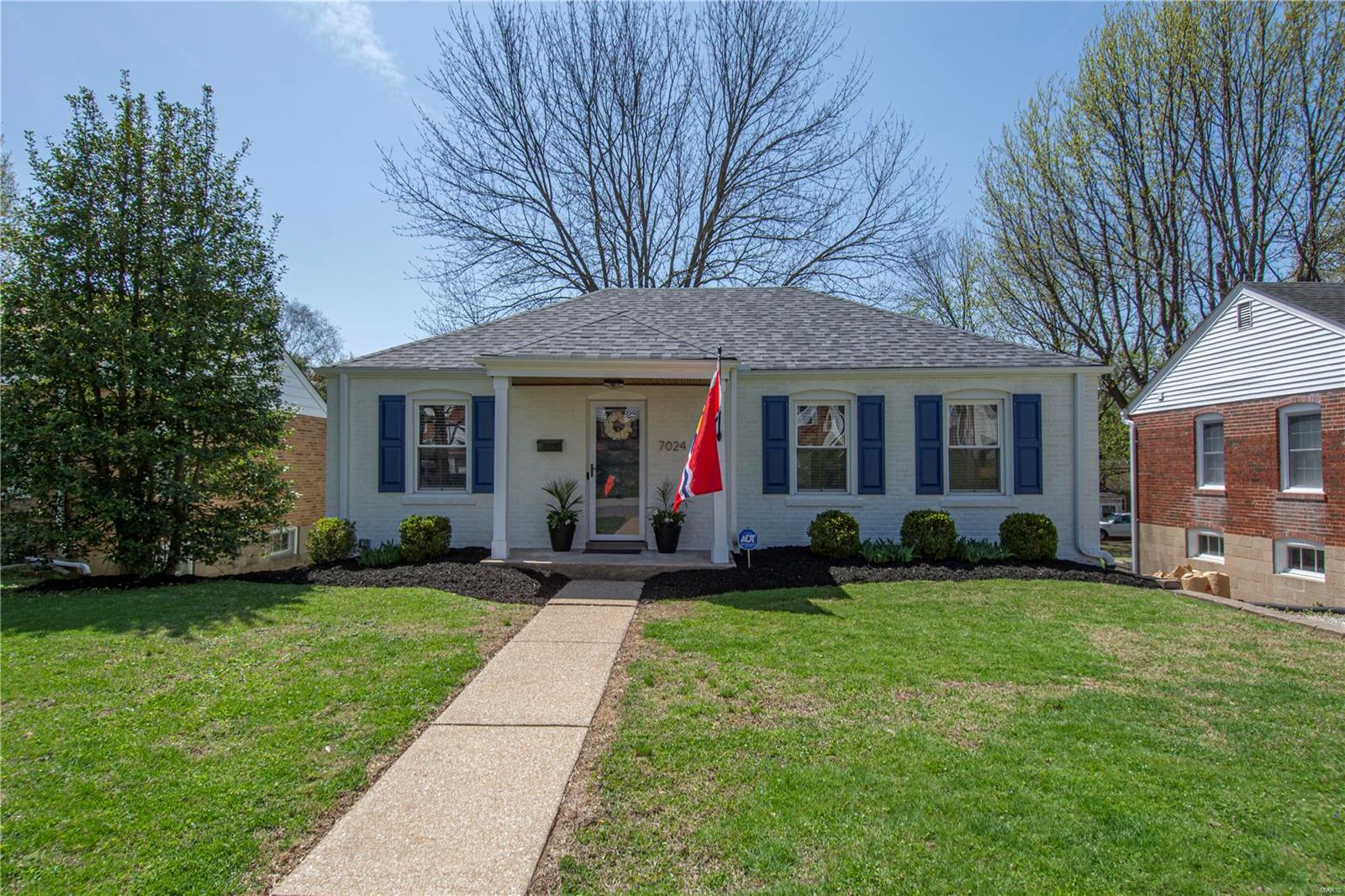 Est. 1943: HEADS UP! Absolutely adorable and move-in-ready brick bungalow that is loaded with charm & updates is ready for a new owner! Start with the sharp, fresh curb appeal & landscaping, then enter to find gorgeous oak hardwood floors throughout the main floor! Great floor plan offers a lrg formal living room that leads via an archway to a formal dining room, then to a bright & quaint kitchen — appliances included! 2 nice sized bedrooms & a full bath round out the main floor. A great newly-built deck off the kitchen overlooks a spacious, fenced backyard. Unfinished lower level offers lots of storage, laundry and a former tuck-under attached garage (still usable but is offered as-is). Off-street parking (driveway abuts the neighbor's drive, but is wide enough for each to park cars on). Fabulous, quiet neighborhood close to shopping, restaurants & more! Plus, tons of updates that include roof (2020), attic insulation, electric panel, spot tuckpointing, gutters & more!