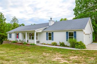 Looking for the peace and quiet that comes with living in the Missouri countryside? This 3 bedroom / 2 bathroom home sits on 3 acres in Lincoln County, just minutes from Troy and within the Elsberry school district, perfect for a young family or those looking to retreat to the country. 

The 1,828 square foot home is highlighted by an open floor plan, wood grain laminate flooring, spacious kitchen, walkout basement, 2-car garage, and a 32-40 pole barn for storage. 

The basement level is unfinished, but could easily be converted into a lower level living space. The area is plumbed for a bathroom to be added if desired. 

The property is located near the end of a dead-end road to minimize "drive-by" traffic and added privacy.