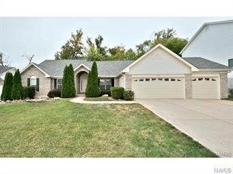 Gorgeous ranch style home w/ 4 bedrooms, or 3 bedrooms & office, in a beautiful sub. on peaceful, wooded lot. Large covered front porch w/ swing, entry foyer has wood floors. Formal dining room is to the right & the living rm w/ wall of windows, gas fireplace & vaulted ceilings are straight ahead. The view is gorgeous.  Wonderfully large eat in kitchen. 1/2 Bath & main floor laundry off the kitchen.  You will also be able to get to the 3 car garage on this side of the home.  Sliding glass door that leads to back yard w/ a deck & patio for entertaining.  There are 3 other bedrooms if you were to go to the left from the entry foyer of the home.  The main floor master is very large & has walk in closet, bathroom w/ dual sinks, separate shower & jet tub.  This home is close to all major hwy's, shopping, schools, parks, etc. $2400 Bonus if rented by 11/15/15 w/ 1 year lease.