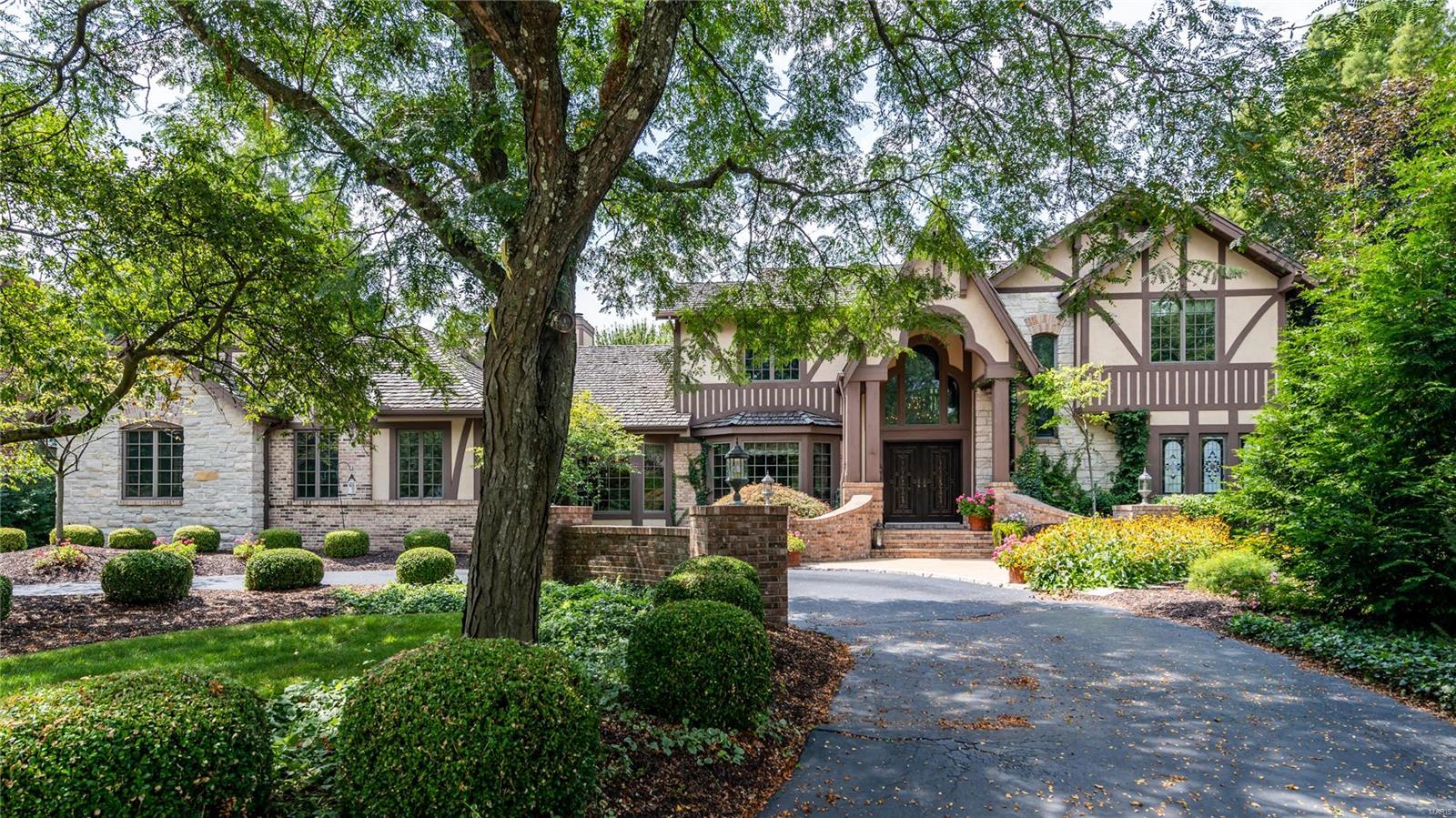 Sensational home located on a cul-de-sac backing to acres of common ground privacy. This is an amazing opportunity in Creve Coeur close to hospitals. The circle drive and wonderous curb appeal welcomes you into a 2sty foyer which opens to the living room and dining room as well as a 2sty great room w/stone fireplace and wet bar. Beyond the great room is the breathtaking kitchen w/all the luxuries you would expect. Opening to the kitchen is the fabulous hearth room w/box beam ceiling, built-ins and fireplace. The main floor primary suite offers a large bedroom, stunning sitting room w/fireplace, walk-in closet and luxury bath. The great room, hearth room and primary suite all open to a phenomenal award-winning indoor pool w/tile deck and gorgeous surroundings. Also located on the main floor is a fantastic in-law suite w/fireplace and bath.  Three more bedrooms and hall bath are on the 2nd floor along w/a finished lower level. Outside finds patios, decks, gazebo and gorgeous landscaping.