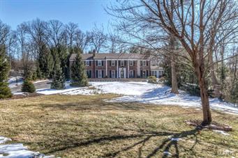 Stunning 5bd/6bth 2-story showplace on picturesque 1.23 acre lot in prestigious Woodcliffe subdvsn! 5300+ sqft of living spc. Foyer leads to cozy Den w/fireplc; beautiful Living Rm w/fireplc; sunlit Florida Rm w/French drs; formal Dining Rm; gourmet Kitchen-Brkfst Rm w/ custom cabinets & SS appliances; fantastic Game Rm & 2 Powder Rms. 2nd flr has spectacular coffered Master Ste w/dressing hall w/built-ins, walk-in closet, fireplc, luxury Masterbath w/dbl vanity, jetted tub & separate shower & gorgeous vaulted Sitting Rm; 4 more bedrms; & 2 more full baths. Finished LL boasts Rec Rm w/decorative fireplc, Workout Rm & full bath w/lrg steam shower. Features: custom millwork, 3 wetbars, alarm, inground sprinkler & huge attached heated 4 car garage. Enjoy the extensively landscaped grounds, fantastic brick terrace, inground pool, hot tub & park-like neighborhood! Great location-Ladue School dstrct; near restaurants, shops, art galleries & hwys! Additional Rooms: Sun Room