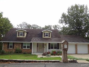 3/4 acre (more or less) mostly wooded lot at end of street. 1.5 Story, 4 bedrooms with 3.5 baths. In 2005 remodeled kitchen with wood cabinets and hardwood floors. Wood floors in foyer, dining room and breakfast room. Covered deck is 1,925 square feet and open deck is 547 square feet, one storage area off oversized garage (doors and openers new in 2015).  Upper level newly painted and carpeted in 2015 with 3 crawl space storage areas. Walk out lower level has kitchen, full bath, rec room with large storage area and including cedar closet and one shop area. Lower level could be converted to mother-in-law quarters. 6 plus parking area. C-6 Fox School District. Great place to raise a family and entertain in this home.