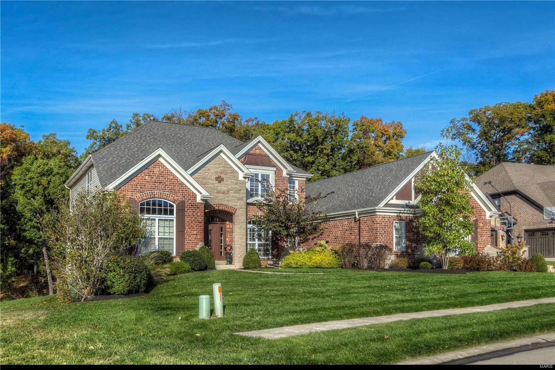 It has arrived! If seeking housing in this fine sought after St. Charles County community, look no further. Save 10’s of 1,000’s compared to new construction pricing today. Approximately 4,000 square feet of customized quality in 2 levels plus an additional 2,000 square feet in the amazing walk-out lower level. Triple zoned heating & cooling, 2 fireplaces, 4 full bathrooms, 5 bedrooms, gracious 2-story great room opening into expanded kitchen & hearth room, extensive hand scraped hardwood throughout most of the main floor plus a magnificent finished lower level with theater room, awesome bar, family area, game area & 5th bedroom all designed for the true entertainer. Outside a true paradise with near acre wooded lot all iron fenced, heated 3 year old salt water pool with extensive concrete decking, newer deck, professionally landscaped & 10 G’s invested in custom garage with new cabinetry & poly flooring. Make it your castle!!!!!!!!!!!!!!!!!!!!!!!!!!!!!! Additional Rooms: Mud Room