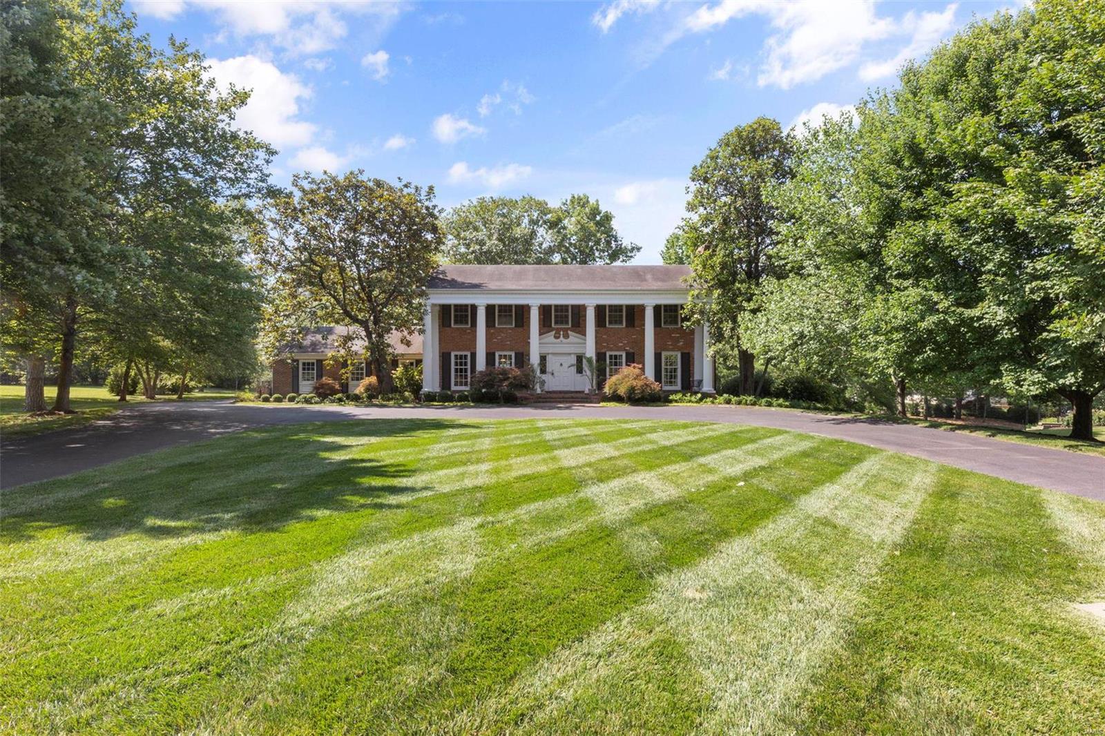 This Impressive 2-story situated on 1+ acre will take your breath away. Enter into the 10x10 Elegant Entry Foyer. This home boasts an Updated & Open floor plan -- luxurious finishes thru-out. The epitome of elegance & sophistication.  The Backyard is a true paradise w/ stunning pool & spacious brick patio.  All hardwood floors seamlessly flow thruout. Gourmet kitchen offers High-End appliances, Huge Center Island, granite counters & flows into Spacious Dining Area & Open Family Rm. Ideal Design for entertaining.  Gracious Liv Room & main floor office. Second floor has 4 spacious bedrms & 2 full baths. Large Primary Bdrm w/ walk-in closet & Newer & Expansive spa-like bath w/ balcony overlooking the grounds. Walk-out Lower Level has even more living space w/ large rec rm, media rm, half-bath & laundry room. Mudroom (could be laundry rm) on main opens to 3-car garage. The current owner has renovated & added a beautiful 2-story addition to home in 2018. EXTENSIVE Updates & Improvements. Additional Rooms: Mud Room