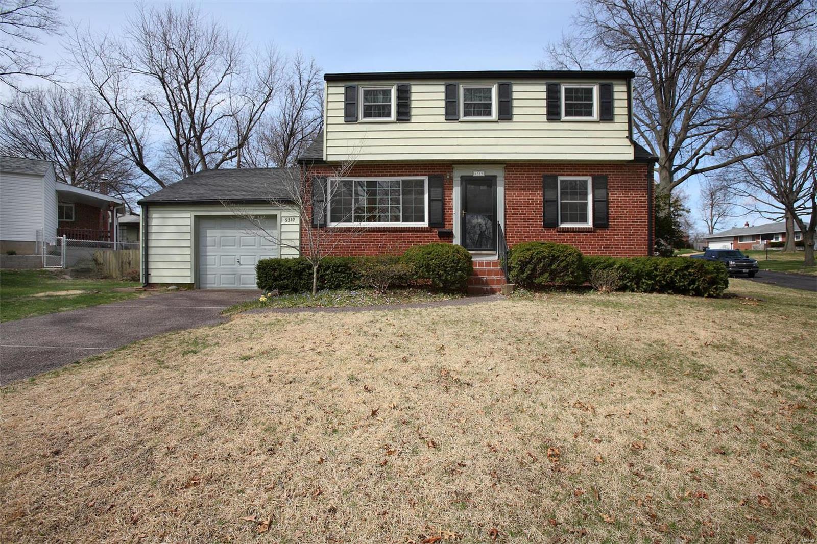 Charming 1 1/2 story on large corner lot with mature trees in Heege View subdivision and Affton School District.  Enter into the expansive Living/Dining Room combination with hardwood flooring and built in bookcases.  Natural sunlight streams through the newer insulated double hung windows.  One spacious bedroom on main floor and two large bedrooms upstairs makes for many bedroom/office options.  Eat-in kitchen with pantry walks out to fenced back yard.  Spacious partially finished recreation room in lower level makes great additional living space.  Oversized attached garage with insulated door and beautiful aggregate driveway and walkway.  Close to shopping and restaurants. Great starter home, come out and see today!