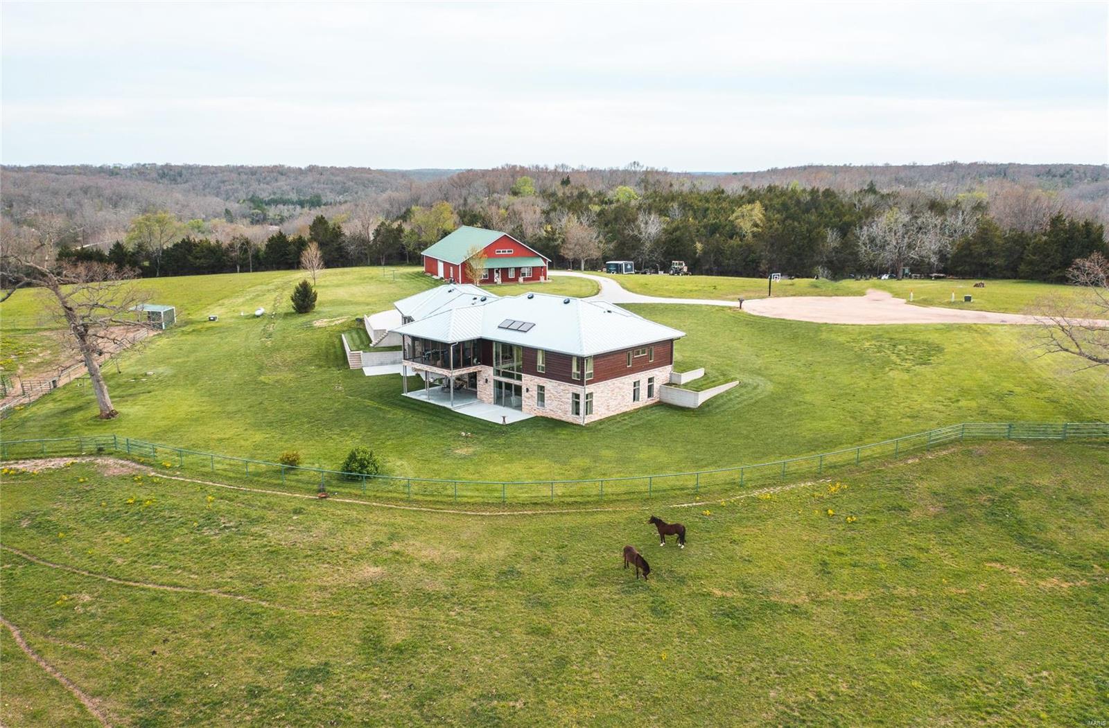 2 Incredible homes! Amazing 6,160 sq/ft custom built home on nearly 10 acres with separate guest home with 1,344 sq/ft, 3bed/1bath living quarters and large garage space. What do you get when an elite, custom-home builder and his wife build a home for their family? An incredible home with a level of attention to detail and efficiency that is second to none. This 4 bedroom, 5 bathroom home was meticulously designed and executed with the result being a level of quality that is rarely seen. This is apparent before you even walk through the breathtaking 8' tall walnut front door. The kitchen features custom tiger-wood cabinetry, quartz countertops, and top of the line appliances by Miele, Northland, Gaggenau and sharp. The master suite makes you feel like you're in a high-end spa with the natural lighting, and steam shower with aromatherapy and built-in speakers. More detailed list of features are included in the photos. Main home only and approx. 7.3 acres also available MLS#23074026 Additional Rooms: Mud Room