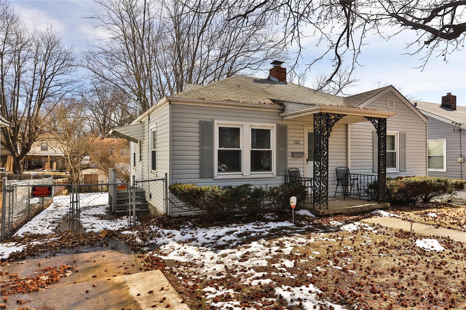 Charming bungalow offers lots of natural light! Very well maintained home with newer siding, newer awning and gutters, and a lovely  fenced yard with lots of greenery. The kitchen leads to the backyard and the large patio area perfect for entertaining! 2 bedrooms and a full bath complete the first level. The HVAC and Electrical Panel are also newer. The lower level offers great storage and could be partially finished quite easily. Off-street parking.