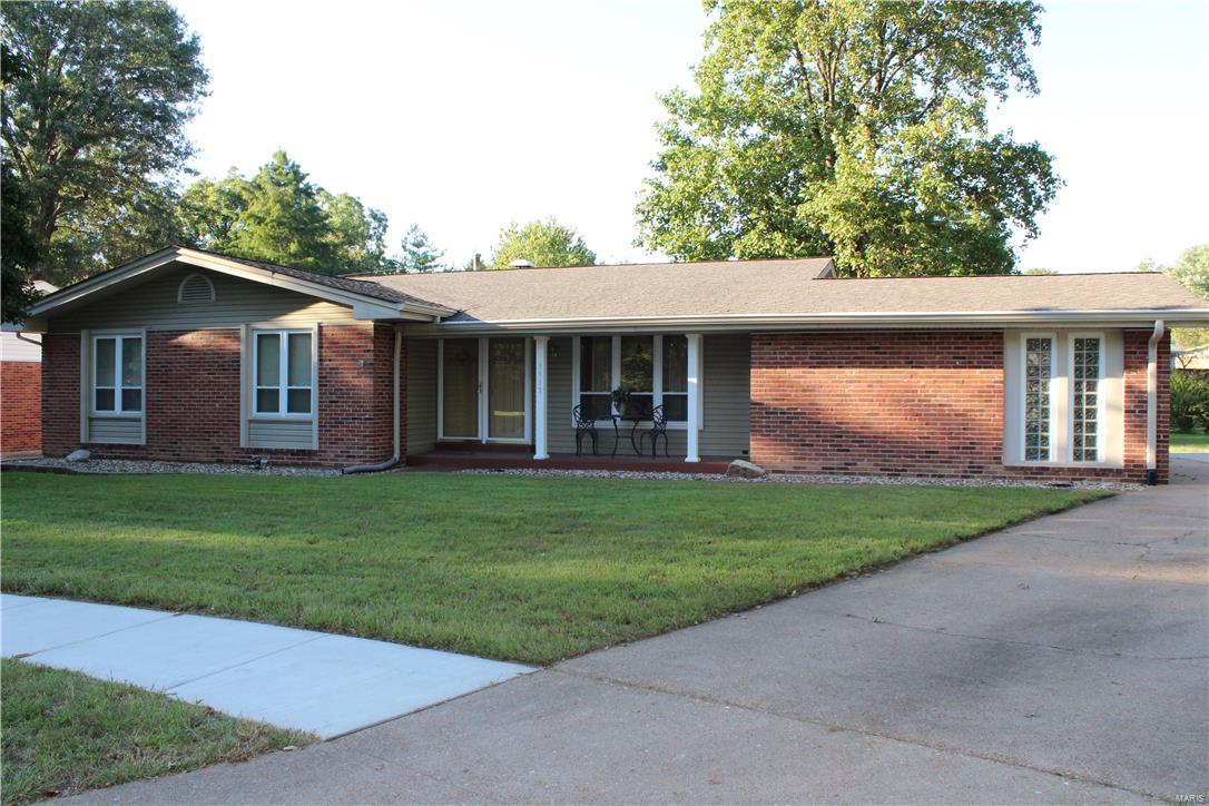 This home features 4 Bedrooms with 3 full baths, 2 car rear garage parking.  Home includes Living room and Family room on main level with hardwood floors, & wood burning fireplace.  Family room leads offers sliding glass door for patio entry.  Kitchen is updated with gas stove, new dishwasher, built in microwave, plenty of cabinet/counter space, & breakfast area that you will enjoy!  Master bedroom has its own bath (updated) , and walk in closet.  Basement is full in size, extra room in lower level with full bathroom.  Backyard is leveled with fencing.  Extra concrete slab for more parking installed by Seller.  Will sell fast!