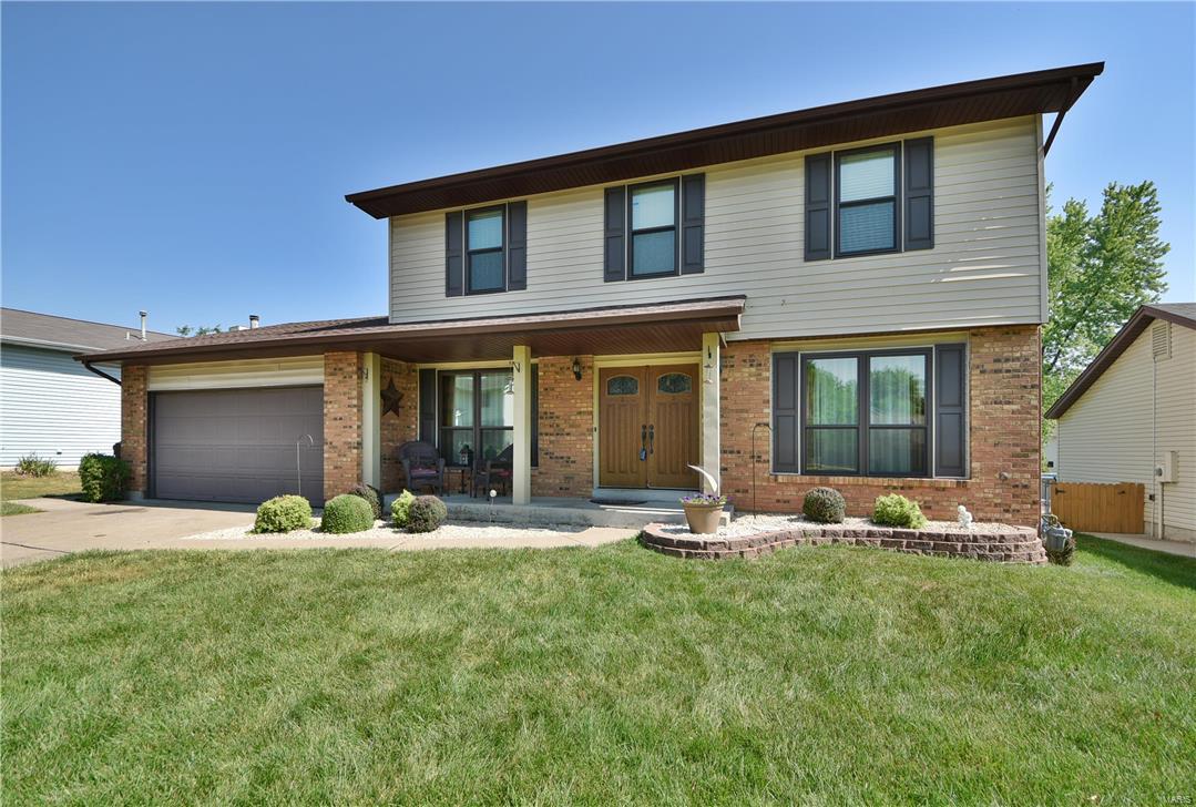 Everyone will instantly enjoy this spacious 4 bed/2.5 bath brick-front 2-story home that rests upon a peaceful cul-de-sac you'll absolutely love to come home to! The double door entry welcomes you into the center hall entry foyer with handsome hardwood flooring that stretches throughout the main floor hallway, great room, powder room & kitchen. The great room also features a floor-to-ceiling brick-fireplace & French walk-out to the huge back patio & large level yard. Entertain in style with the formal dining room + the bright eat-in kitchen offering ample custom cabinetry, ceramic tile backsplash & corner set windows above the sink. Spacious master suite with a walk-in closet & private full bathroom. Easy parking with the attached 2-car garage & additional off-street parking. Enjoy the nearby walking & bike trails that lead to Rec Plex Park! Treat yourself with an Appointment to view this one Today! Additional Rooms: Mud Room
