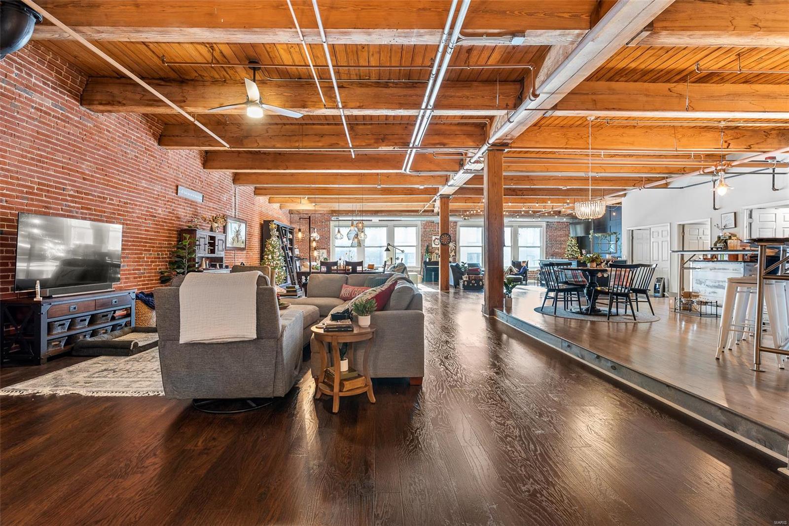 Step into the epitome of modern industrial luxury with this spacious 4000+ square foot loft where urban design meets comfort.The 3 generously-sized bedrooms provide privacy and comfort for everyone. Indulge in the custom primary bath featuring a luxurious wet room. The expansive walk-in closet is a fashionista's dream. The gourmet custom kitchen with stainless appliances, sleek white cabinetry and an open layout make it perfect for both cooking and entertaining. Attention to detail shines through in the impeccable finishes throughout the loft. Every corner exudes quality and sophistication. Located in a walkable neighborhood, you have easy access to bars, restaurants that make urban living so exciting. Close to all pro sports venues.This loft isn't just a home; it's an urban oasis where style and convenience merge seamlessly. Building only has 9 residential units. Owners really get to know each other. You will feel the sense of community at once. Common area upgrades in future plans.. Location: City, Downtown, Upper Level