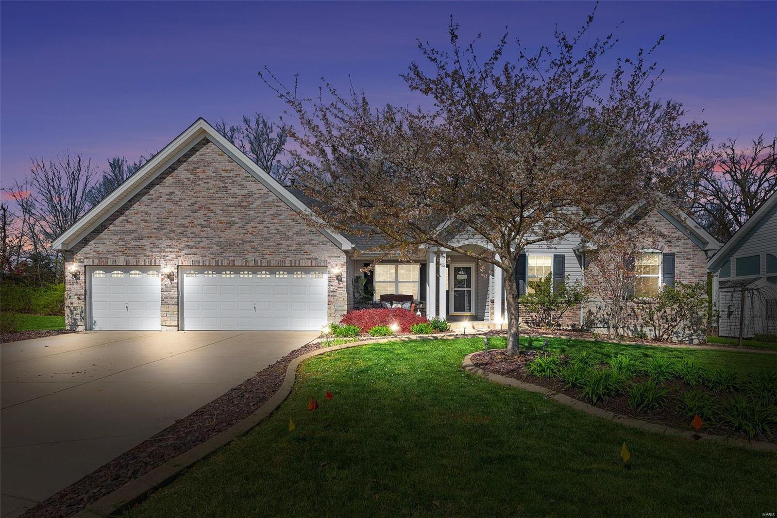 Lovely ranch with open floorplan and beautiful backyard perfect for entertaining. Step inside to vaulted ceilings and luxury vinyl plank  flooring! Renovated kitchen with new center island, new counters & backsplash, gas range, and walk in pantry with custom shelves & countertop.  Family room offers wood burning fireplace flanked by custom shelving. Formal dining room. Main floor laundry room with closet and cabinetry. Huge covered patio with ceiling fan and canned lighting, deck off the master suite, tree lined yard, corner lot with common ground to the left! Seller can accommodate a quick close.