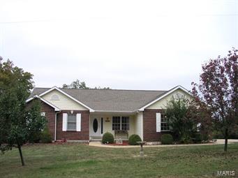 Great location in Hillsboro, easy access to New Highway 21. Beautiful well maintained 3 bedroom, 1800+ sq feet ranch on over 2+ acres. Has asphalt drive and right off county road. Large master bedroom suite with sitting area, walk in closets, master bath with whirlpool tub and separate shower. Living room has vaulted ceilings that gives that open feel. Formal dining area that could be used as a main floor office. Kitchen is bright and light with a lot of cabinet space and huge pantry. Separate room for laundry. Enjoy the covered deck in all weather. Backs to wooded area for privacy plus a great sunny spot for a garden.