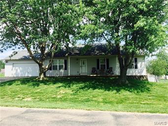 Charming home in Forest Meadows Subdivision. Home has newer laminate floors and large in eat-in kitchen with pantry closet. Plenty of room to spread out! The open concept living room and kitchen have vaulted ceilings, and the spacious, fenced in backyard features a two tiered deck & above ground swimming pool.