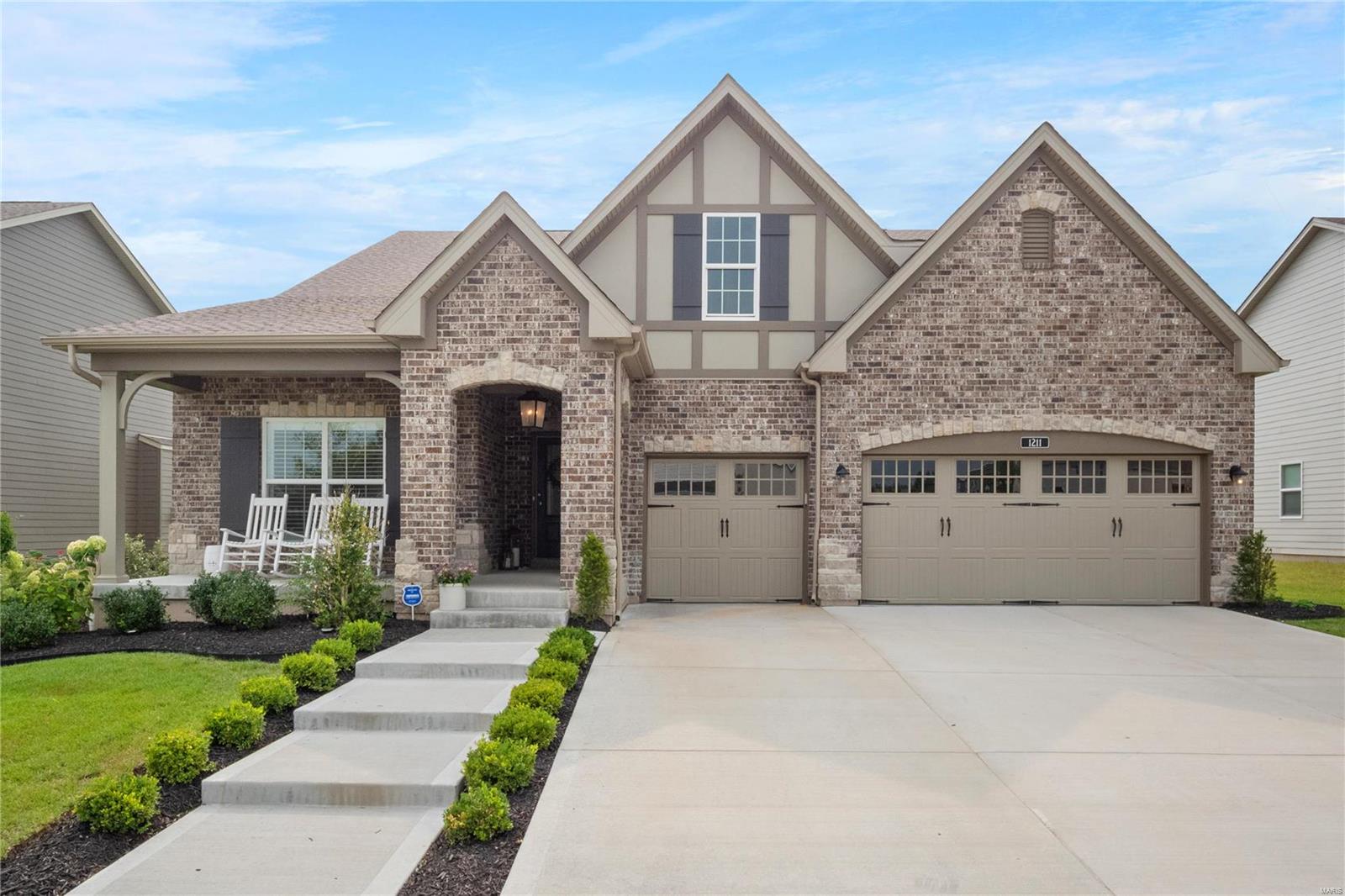 As soon as you step inside, you will want to call this house "home." Stunning 1.5 story located in the much desired Fienup Farms
subdivision, this 3-year-NEW-home boasts more than $100,000 worth of premier quality upgrades. Professionally landscaped,
situated on a level lot, w/ the brick elevation adding tons of curb appeal. Enter to find a completely renovated kitchen w/ beautiful
cabinetry & a huge center island w/ Carrara marble counter tops, as well as SS appliances. Spacious 2 story great room offers a gas fireplace surrounded by gorgeous cabinets. Two of the bedrooms are located on the main floor, including the primary suite w/ a lovely upgraded primary bath. 3 additional bedrooms are upstairs, which includes an immense bonus room. The lower level contains 2 egress windows & rough-in plumbing. Fienup Farms homeowners enjoy wonderful amenities including fishing, paddle boats, pickle ball, pavilions, playgrounds & a charming 26 acre lake surrounded by walking/jogging trails. Additional Rooms: Sun Room