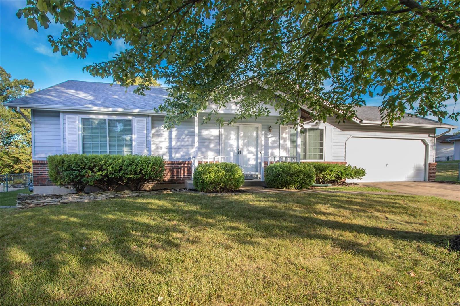 Great room ranch with three bedrooms and two baths on a nice private lot backing to mature trees, quiet culdesac lot.  2 car oversized garage with service door (garage door updated about 2 years ago) Roof apx 2 years old, HVAC new Feb 2021, hot water heater axp 2 years old.  This home offers an open kitchen to breakfast room floor plan ! the breakfast room offers wood floor, slider to patio over looks level yard, kitchen with gas range, built in microwave, cabinets with pull out shelves & pantry. easy care tile floor.  Vaulted great room with cozy wood burning fireplace. Master suite with walk in closet, box bay window & full bath.  Bedroom 2 & 3 with gleaming wood floors.  6 panel doors.  Vinyl siding, trim painted in 2020.  Large patio, large level fenced yard with storage shed.  Shopping and dining close by.  Enjoy the St Charles County Parks and so much more.  Additional photos will be in after final home sale prep is completed.