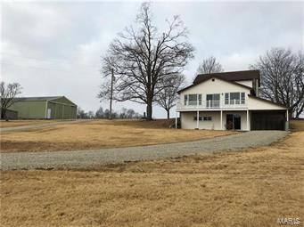 Exceptional Country Estate on 9.25 acres  located less than 10 mile from Washington Mo. Secluded farm home  with large addition in 1988.This property shows  pride of ownership thru and thru. futures Three bedroom 3 Bath with updated electric , HVAC updated .30x60 out building to store equipment and workshop area.  Located in wine country and near many fine restaurants in Washington and the area.