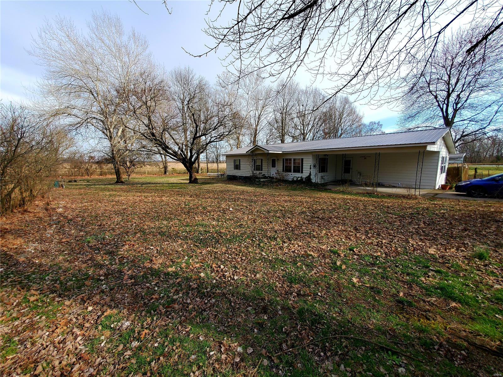 Take a look at this Amazing 3 Bed 1 Bath Home. Siting on just over 7 acres with a pond,shop,pole barn and multiple out building. You do not want to miss this one. call today for a private tour. Additional Rooms: Mud Room