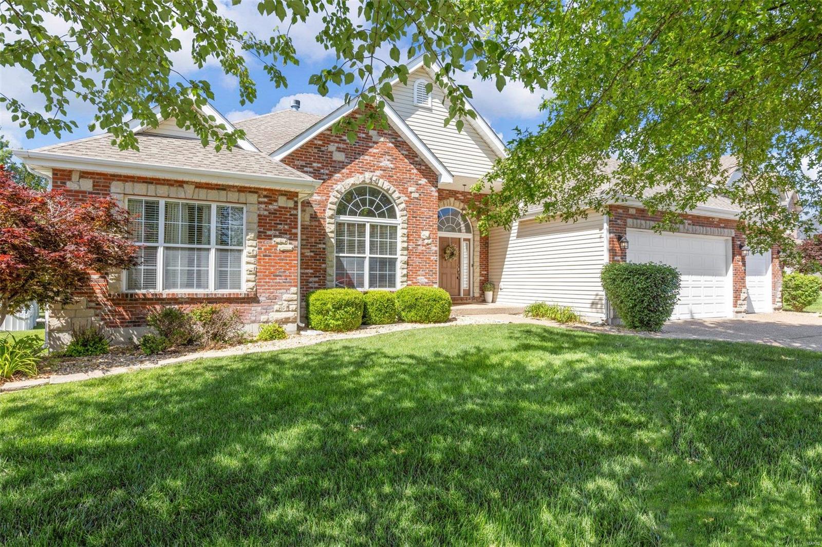 Beautiful great room ranch! Brick and Stone front exterior. Large vaulted great room with wood burning fireplace and built in shelving. Formal dining room. Large Kitchen with 42" cabinets, center island. New quartz counter tops and ceramic tile back splash! Stainless appliances. New roof with architectural shingles in 2023!  Hearth room off breakfast room. Main floor laundry room. Large master bedroom with a walk-in closet. Luxury master bath with dual sinks and separate tub and shower. Large unfinished basement. 3 car garage. Nice peaceful setting in the private back yard