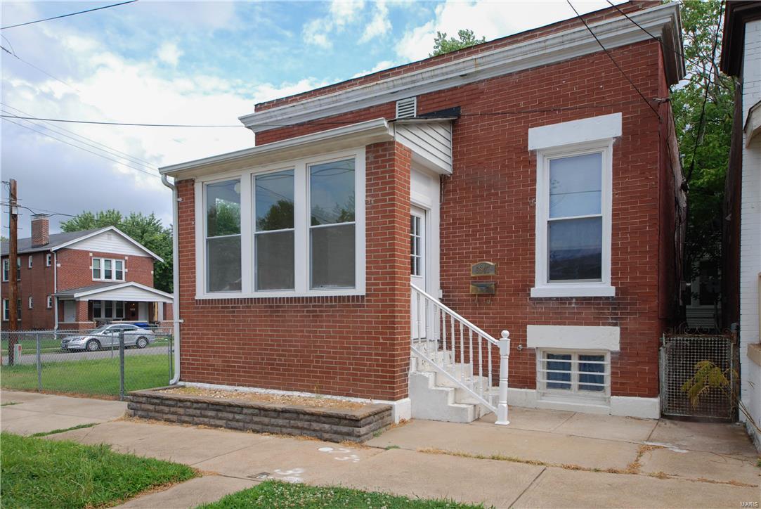 Updated and cute as can be 2 bedroom/1.5 bath bungalow in the desirable Dog Town area is ready for a new tenant!  Updated kitchen with stainless appliances and bath, sunroom, hardwood floors, 2 car parking pad for off street parking, level/fenced yard and a full basement. Refrigerator with ice maker, gas oven, built in microwave and dishwasher are all included. Washer/dryer hook ups. Washer and driver provided at $1125 month.  Great location - Walking score is 72!  No Section 8 please. No cats.  Dogs are allowed with seller approval Additional Rooms: Sun Room