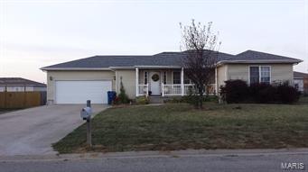 Great family home in well located neighborhood. This is not just an ordinary 3 bedroom 2 bath house, this home features a covered front porch with pretty railing, a unique wood ceiling with indirect lighting in the living room and lots of storage in the utility room. Don't miss this move in ready home.
