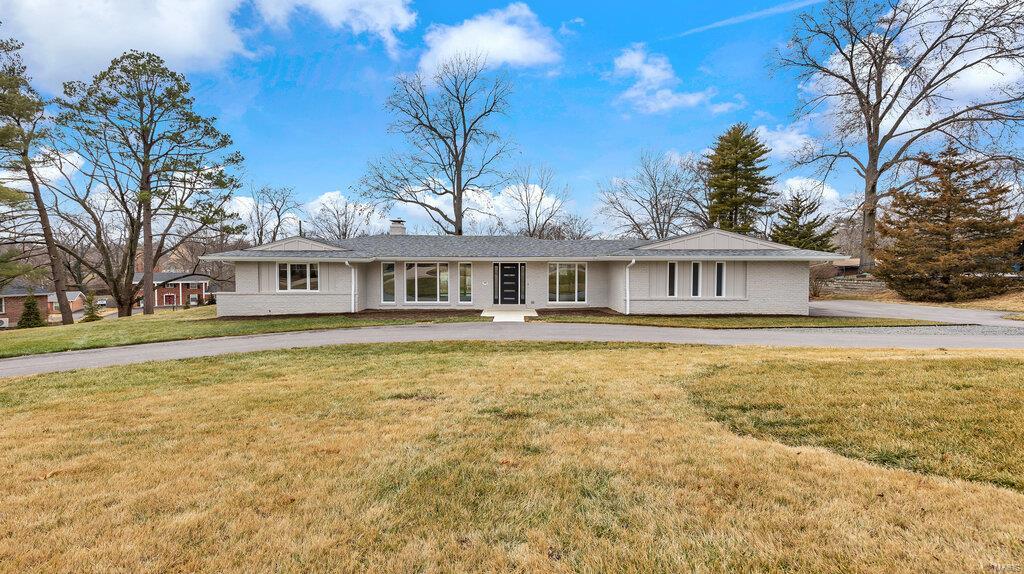 Stunning Home that has been completely updated from the sewer line to the roof! The list of updates include an architectural shingle roof, oversized gutters, downspouts buried underground w/pop-ups, added soffits & fascia. All windows(Low-e argon gas -lifetime transferable warranty), doors, driveway w/added circle drive. Electric panel, basement waterproofing w/drain tiles & sump pump. York furnace & air condidtioner, American Pro Line hot water heater. The main floor is exceptional. Vaulted Great room w/luxury vinyl plank flooring, walls of windows, recessed lights & wood burning fireplace. A chef's kitchen, w/Cambria quartz counters, soft close drawers, Samsung appliances, gas 5 burner range/oven plus Wall oven & microwave/convection oven. Deep stainless sink, instant hot water dispenser, oversized island w/ beverage sink. Main floor laundry rm.  Primary bdrm walks out to the patio, has organized walk-in closet & fabulous bath w/touch light mirrors beautiful shower. MUST SEE! Additional Rooms: Mud Room