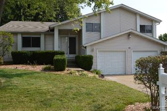 Very well kept, 4 bedroom 2 bath with rare floor plan, seldom available. New carpet throughout main level being installed once seller moves out. Covered porch & entry foyer, separate dining rm, living rm, great rm w/gas fireplace & atrium doors opening to 3 tier deck w/hot tub & pergola. Utility rm w/washer & dryer space & additional storage area. Updated master bath. Master bedroom opens to deck. Updated kitchen w/ceramic floor, cherry cabinets, center island that also serves as a breakfast bar. 3 car garage w/additional storage area. Extra parking space. Beautifully landscaped yard with in ground sprinkler system, fencing, mature trees & perennials (very low maintenance). Vaulted ceilings, ceiling fans, beautiful millwork, some six panel doors, vinyl siding. Located only minutes from RecPlex, shopping areas, schools, places of worship, medical providers & highways.