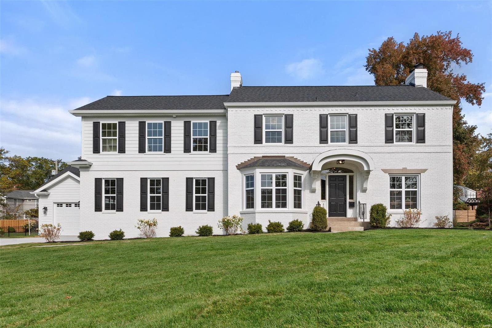 New, new, new. A gracious entry welcomes you, there is an office/den on your right & a gorgeous dining room on your left. Thoughtfully off the dining room is a butler's pantry with a beverage fridge & ice maker. The breathtaking kitchen offers high-end appliances, a large island, custom cabinetry, walk-in pantry & both an eat-in space as well as counter seating. The kitchen is open to the hearth room & it has beautiful cabinetry, a beamed ceiling & a handsome fireplace. Hardwood floors are on the main floor & upstairs, & custom cabinetry throughout. A spacious laundry/mudroom greets you from the 2 garages. Also on the main floor a powder room & the primary suite. The primary has a great size bedroom, amazing bathroom & walk-in closet. The second floor has a sitting area, 4 bedrooms, all with walk-in closets, & 2 full baths. The lower level has 2 finished recreation areas, one of them has a partial kitchen, also a 6th bedroom & full bath. Covered patio gazes over the exceptional yard. Additional Rooms: Mud Room