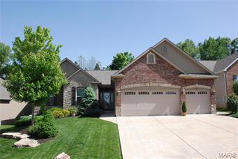 Imagine owning a custom ranch home with numerous upgrades starting at the front door! Fantastic open floor plan entails 5" hardwood floors, 5 1/4" Base Trim. Ceramic tile in Bathrooms, Kitchen, Laundry and Wood floors Bedrooms and Great Room. 6' Low-E Windows throughout Great Room has soaring vaults, brick & stone gas fireplace, with remote start, arch bookcases. Kitchen offers Stainless Steel appliances, 42" Cabinets, Granite Counters, Breakfast Bar, Built-in Desk and Walk-in Pantry. Wonderful backyard with vinyl fencing, Screened 16x14 composite Deck, backs to woods. Laundry room offers custom cabinets & 1/2 bath with large storage closet. Master suite has Crown molding, octagon ceiling, luxury Oversized Shower w/ built in seat, Custom Storage unit, Makeup Counter & Dual Vanities. Over sized Garage, epoxy floor, painted drywall, insulated garage doors. Basement has workbench wood shelving for storage. In ground sprinkler system, and many more egreat features with this home.