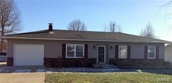 This adorable, move-in ready home has 3 bedrooms, 2 full baths and a large detached garage. Everything in this home has been remodeled and updated; beautiful kitchen cabinets and countertops, flooring, paint, light fixtures, bathrooms, exterior doors, and vinyl siding. 28X28 detached garage built in 2012 has concrete floor, electricity and garage door opener. New concrete patio connects back of house to detached building and driveway. Back yard is partially fenced and the pergola stays. Attached garage is heated and cooled. Could be turned into additional living space if desired. Call today to see this well maintained, cared for home.