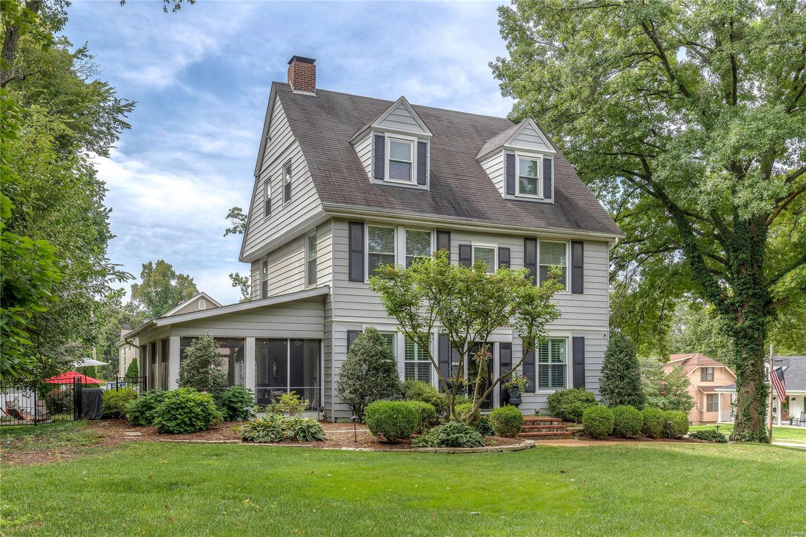 Absolutely gorgeous turn of the century Victorian architecture combined with the convenience & style of modern renovations! Spectacular location! 2 blocks from all that Kirkwood has to offer! Beautifully renovated gourmet eat in kitchen with built in butlers pantry, Viking Stove & Ovens, 42 inch cabinets, granite, crown moldings & center island. 4 Fireplaces throughout the home in the dining room, kitchen, family room addition & master bedroom. Gorgeous family room addition with wood burning stone fireplace & atrium doors which lead to the magnificent in ground hourglass shaped pool. Privacy abounds with fully landscaped gardens surrounding the pool. Multiple patio seating locations & spacious screened in porch. Fabulous bedroom space with a third floor private suite/full bath. Additional amenities include 3 car side entry garage, huge corner lot with sprinkler system, fenced yard, 3 zoned heating & cooling, hardwood floors & side entry circle drive. Come home to East Argonne!