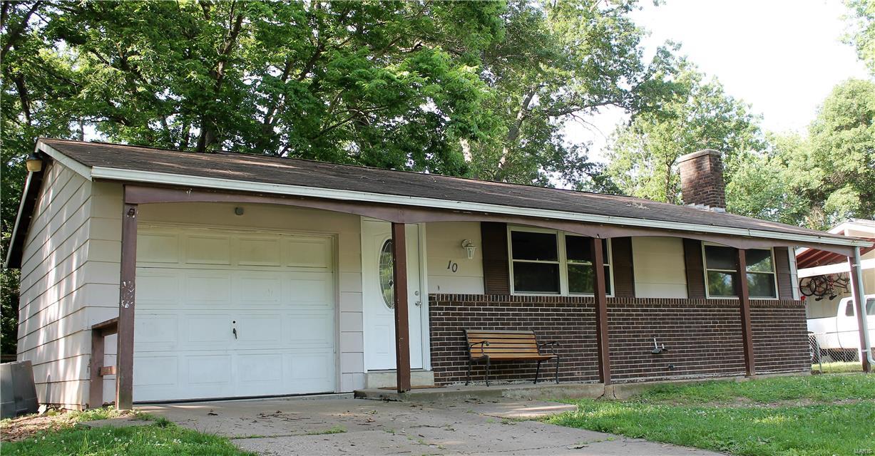 Small Ranch home in Warsen Hills subdivision. Fresh interior paint, new kitchen counters, laminate floor in kitchen, hardwood floors through out rest of house. Partially finished lower level with a wood burning fireplace. Nice size corner lot on end of street that backs up to a small creek and trees. Good home for a first time buyer or as an investment property.
