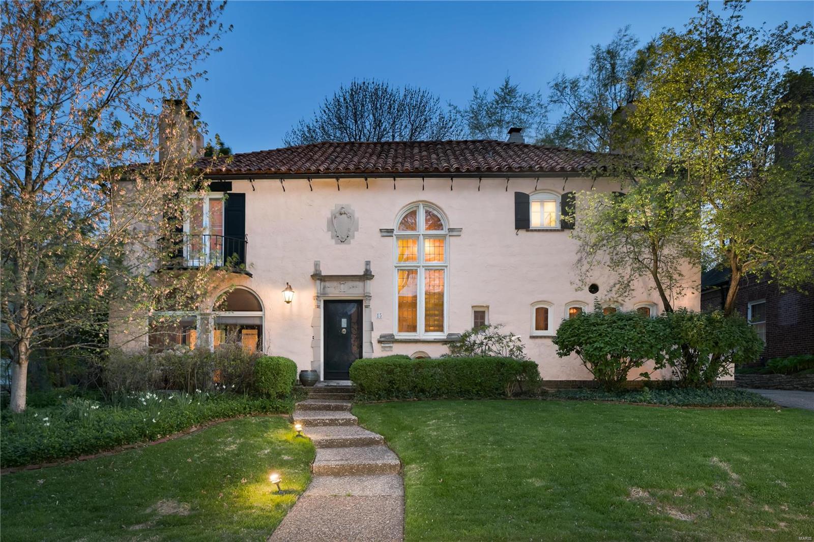 Mediterranean Maritz & Young designed home on one of Clayton's most desirable lanes. Hallmarks of the esteemed architects include numerous doors which bring outdoors indoors, open-plan living, terrazzo flooring, rich period millwork, numerous archways and intricate ironwork. Four bedrooms, three and one half baths, encompassing 3,600+ square feet of living space including a post-construction hearth room off the kitchen, converted from the original garage. An expansive rear yard and patio, is welcoming outdoor entertaining space, with ample room for a garage addition. The primary bedroom suite features two Juliet balconies, dressing room, and full en-suite bath. Two additional bedrooms share a bath and 4th bedroom is a full suite (currently used as office). Front and back sets of stairs. The kitchen and hearth room are joined by a see-through fireplace. Clay mission-style tile roof installed only 30 years ago. Newer systems in '20 and '21. Current owners have occupied almost 60 years.
