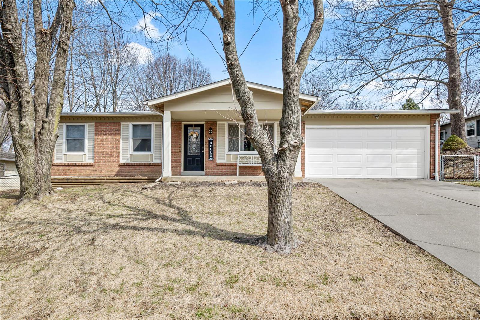 GET READY TO MOVE to this charming 3 bed converted to 2 Bed, 1.5 bath home w/ UPDATES GALORE & 1500+/- sq ft of Living Space!  Wood Plank & Laminate Floors thruout Main Level. Bright & Open Family Room leads to the HUGE Dining & Kitchen w/ Wood Cabinets, Brick Backsplash, Moveable Center Island, Pantry, Stainless Appliances, 5-Burner Gas Range & NEWER Refrigerator stays! Primary Bed w/ NEWER Bamboo Wood Plank Floors & TWO Full Size Closets! Updated Half Bath! Nice Sized Beds #2 & #3! Tiled Main Floor Full Bath. Finished Lower Level HUGE Recreation Area & Laundry- NEWER Washer/Dryer stays! Lots of storage space! TWO Car Garage is 27’ Deep! Newer Garage Door & Concrete Drive! Fresh Neutral Paint, Lighting & NEWER Windows! Roof- 2021. Gravel Patio/Paver Inlays in the HUGE FENCED yard w/ Mature Trees! NEWER French Drain & Sewer Lateral. One-Year Home Protection Plan. Enjoy the nearby City of St. Charles- Shops, Restaurants, Main Street, Parks, Programs & MORE! Perfect for any commute!