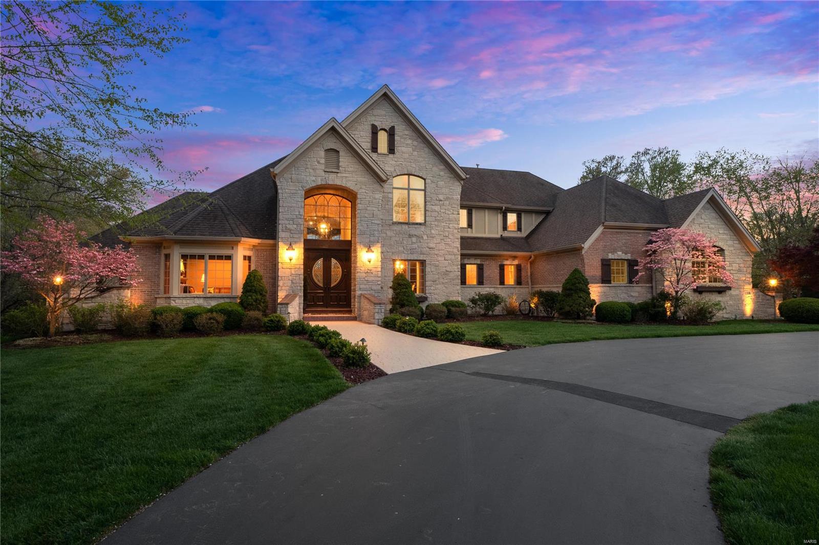 Masterful, custom manse offers an impeccable balance of vibrant taste and high-end finishes. Designed by Lauren Strutman, built by Mike Terbrock. Grand entrance with library and dining room invite you in then prepare to be captivated by the 2-story great room with fireplace and built-ins. Stylish, eat-in kitchen features custom cabinetry, Wolf, Sub-Zero, Miele, and Asko appliances, plentiful counter space, and opens to the vaulted hearth room. The sunroom overlooks the resort-style backyard with incredible 40’ saltwater pool, spa, raised terrace with fireplace, and entertaining pergola with kitchenette. The primary suite, also with stunning views features an office, custom closet with professional organizers, and lavish bathroom. The LL offers another family room, gym, theatre, full bar, game/rec room, sauna and opens out to the pool area. Every single detail was considered, and no expense spared. Control4 system, 4 car garage, laundry on each floor, & much more in a perfect location. Additional Rooms: Mud Room, Sun Room