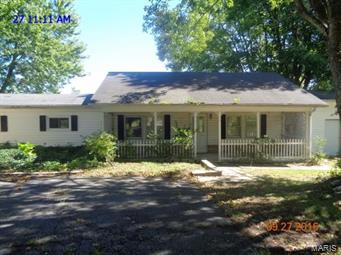 Country setting for this 2 bedroom, 2 bathroom ranch style home consisting of 1400 plus square
feet. Property consists of 9.1 acres with a barn, shop with electric, 2 car detached garage, and a
nice sized stocked pond. The house has a covered front porch and a wooden deck looking out at the
pond. Barn has electric and water, 4 stalls, tack room, and loft. Great property for horses or your
choice of livestock. Property is mostly pasture with perimeter fencing and 2 cross fences. Paved
circle drive and white vinyl fencing across front of property. Yard is full of trees and flower beds.
Property located between Salem MO and St James MO for job opportunities and town amenities. Not
far from Rivers for floating and water fun and Mark Twain National Forest for hunters in the family. Property sold AS-IS. Bank Owned. Owner does not make any representations or warranties. SpecialListingConditions: Foreclosure