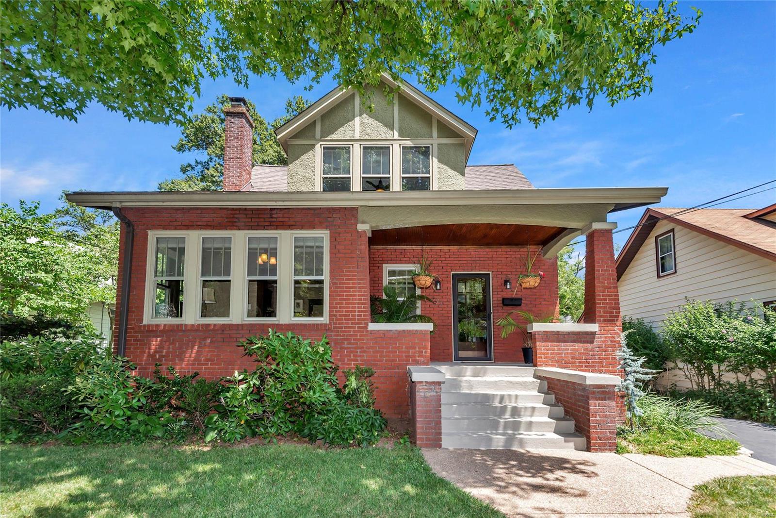 Charm of the 1920's, with the function of the 2020's, in classic Webster! Beautifully, updated brick Arts & Crafts home two doors from Margaret Park, only a block from Avery Elementary. Gleaming hardwood floors, period millwork throughout, with stain glass windows and glass doorknobs. Chef's kitchen features granite countertops, slate backsplash, stainless appliances (some are brand new, dual fuel range/oven) and breakfast bar opens into dining and living rooms. Spacious open floor plan, accented by 9-foot ceilings and a gas fireplace warms the hearth. Generous bedrooms upstairs with bonus children’s hideaway off of the back bedroom. Lower level partially finished with ample workout room and play space, bathroom, laundry room, pantry and lots of storage area.