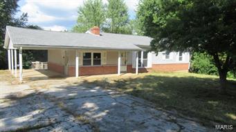 This ranch home features 2 bedroom/1.5 baths, eat-in kitchen, large family room with fireplace, , 2 good size bedrooms on the main floor.  The master bedroom features a half bath Covered parking, covered rear deck and front porch. Just under a half acre lot.  Partially finished basement, fenced backyard.  Make your appointment today.  This is a Homepath Property.  $500 Buyer's Agent Bonus is available on this property.  Buyer's Agent must request bonus at initial offer. SpecialListingConditions: Foreclosure