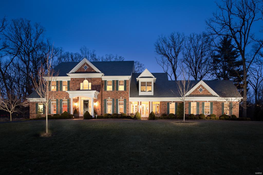 BIG PRICE REDUCTION!  Immersed in detail, find soaring ceiling heights with custom detailing on all levels, custom casework, gleaming hardwood floors and designer fixtures throughout this 8 yr old custom home situated on one lush acre.  Well-appointed with formal din rm, wood paneled den, 2 story grand entry with curved staircase, and light filled great rm with wet bar.  Custom kitchen with 2 islands, granite, high end stainless appliances, and breakfast area adjoin the large hearth rm with many windows, stone fireplace, custom built ins and 14 ft barrel vaulted wood ceiling.  The luxury master suite has his/her vanities and custom closets, dual head shower, whirlpool tub and gas fireplace.  A guest powder rm, mudrm with bath and back staircase complete the 1st floor.  Upstairs find 2 bedrm suites and 2 bedrms with jack and jill bath.  The partially fin low lev has bar/kitchenette, rec rm, 6th bedrm  full & bath.  A beautiful pool, patio with outdoor fireplace, 4 car heated gar & more. Additional Rooms: Mud Room