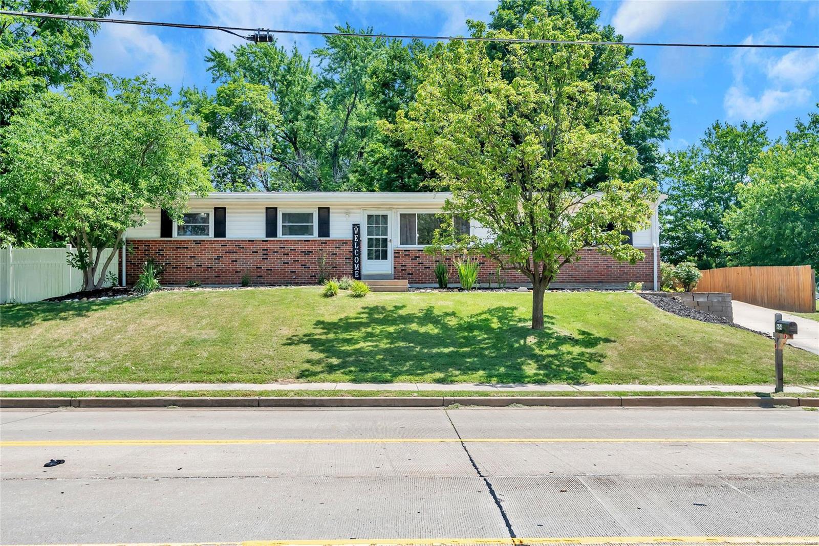 Wonderful ranch home with large level fenced lot in St. Charles County! Seconds from Barnwell and Becky David. This home features 3 spacious bedrooms and gleaming hard wood floors throughout. Kitchen has ample counter and cabinet space, refrigerator to stay. Lower level is unfinished, but does offer a full bath. This parcel makes you feel like you are at the park situated on nearly half an acre with ample shade and space! Lot is perfect for a pool, extra outbuilding, or whatever you desire! Roof 2017, AC 2017, Water Heater 2018, newer gutters and gutter guards 2021. All of this just minutes from the Page Ext, I-70 and Mid Rivers Mall Drive.